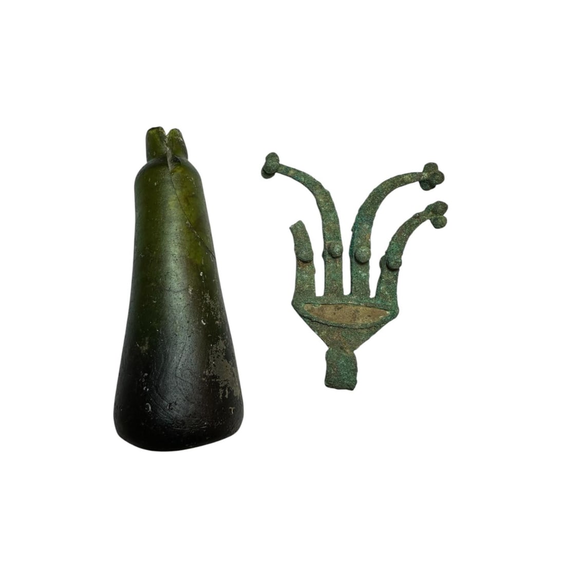 Antique Islamic Glass Bottle, Luristan Bronze Ornament c.1000 BC- 10th century AD.: Antique Islamic Glass Bottle, Luristan Bronze Ornament c.1000 BC- 10th century AD. Size 4 5/8 - 3 5/8 inches high. Ancient Islamic green glass bottle together with a cast bronze ornament. Provenance: