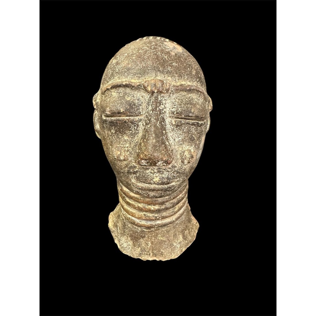 Africa, Nigeria Benin Pottery Portrait Head.: Africa, Nigeria Benin Pottery Portrait Head. Size 6 1/4 inches high. Thick pottery head portrait of a youth with closed eyes and lips. Provenance: EX: Seymour collection acquired the collection in the