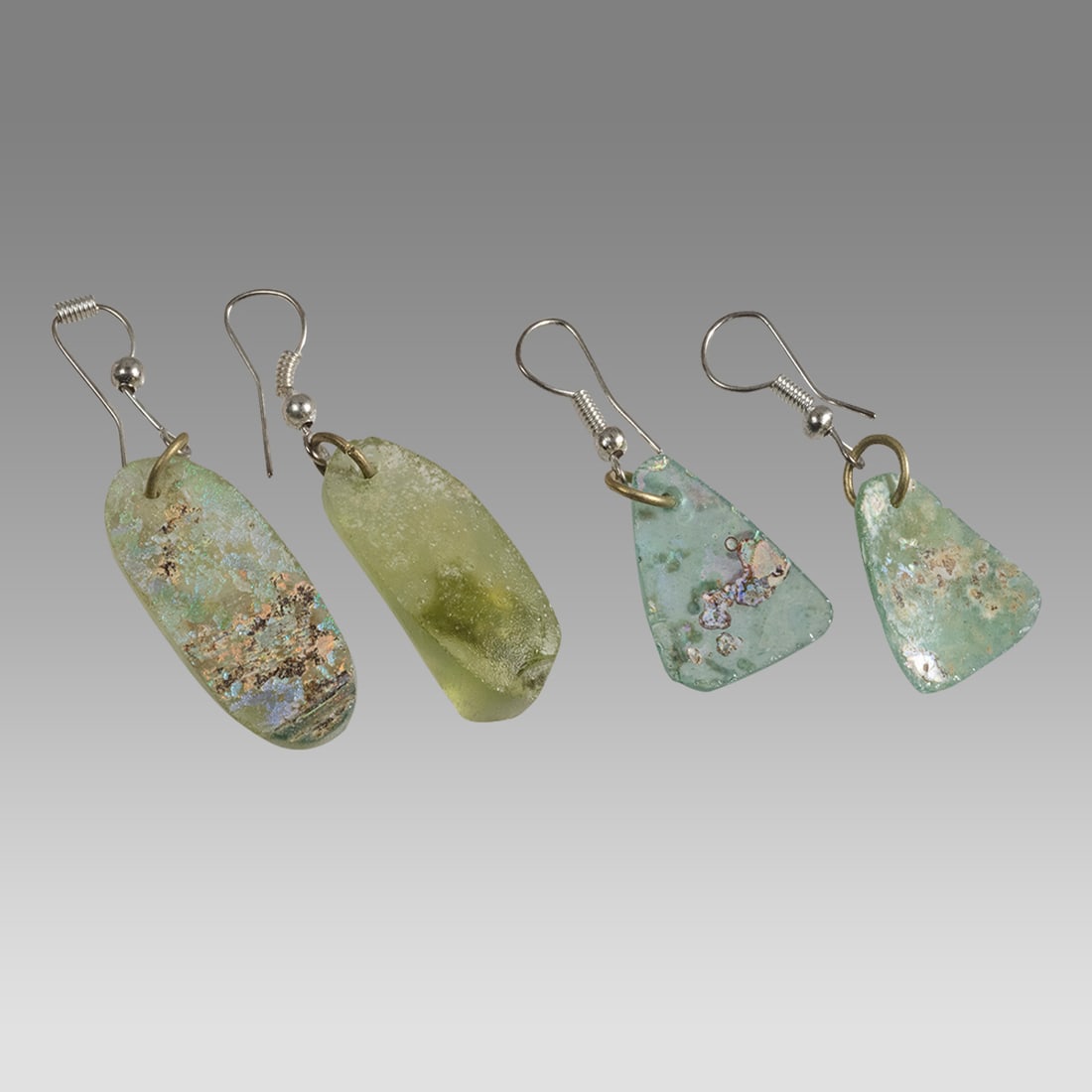Lot of 2 Ancient Roman Glass Fragment set in silver earrings. (1 of 1)