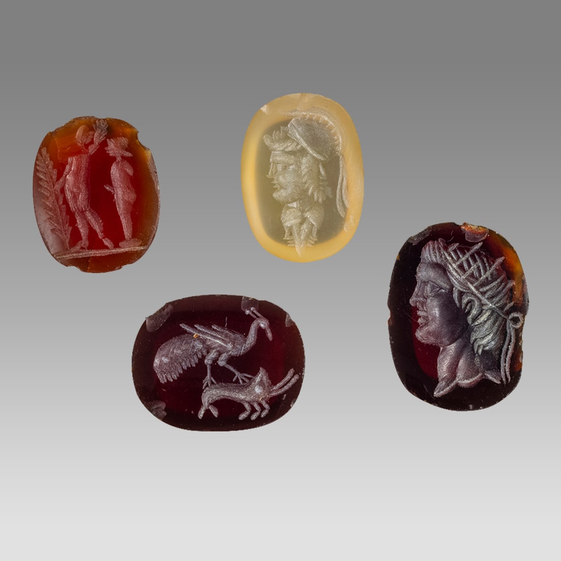 Lot of 4 Roman Style Carnelian Ingtaglio ring stones. (1 of 1)