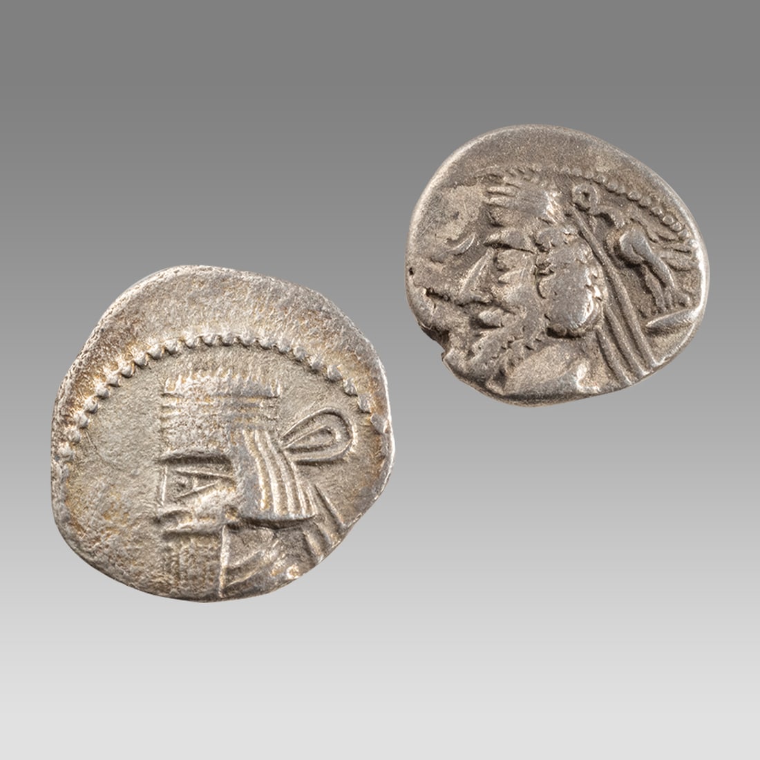 lot of 2 parthian Silver Drachms Vardanes I 38-2 BC.: lot of 2 parthian Silver Drachms Vardanes I 38-2 BC. Size 21 mm, weight 2.85 grams. And PHRAATES IV AR DRACHM, PARTHIA 38 - 2 B.C. Size 18 mm. weight 2.82 grams.