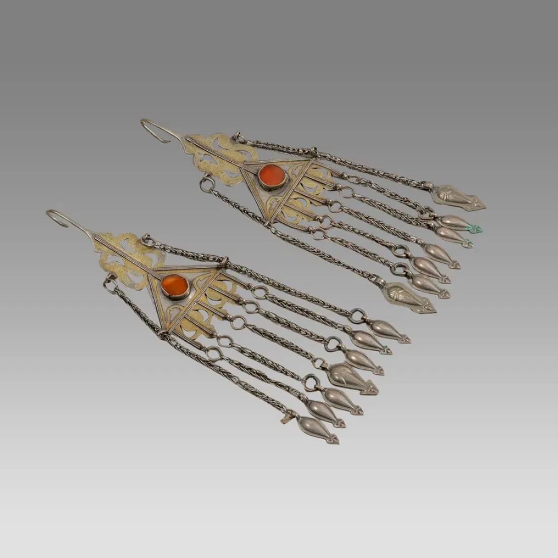 Pair Tekke Turkoman earrings/temple ornaments in good silver with carnelian insets. (1 of 2)