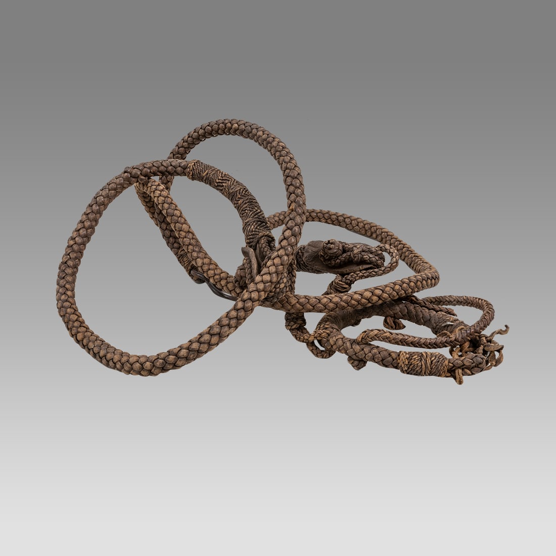 Huaquero Braided Leather Animal Tether 20th century,: Huaquero Braided Leather Animal Tether 20th century, Peru. Size 55 inches length. Provennace: Estate of David Sheridan, Branchburg, NJ., acquired 1950’s to early 2000’s, by descent to family.