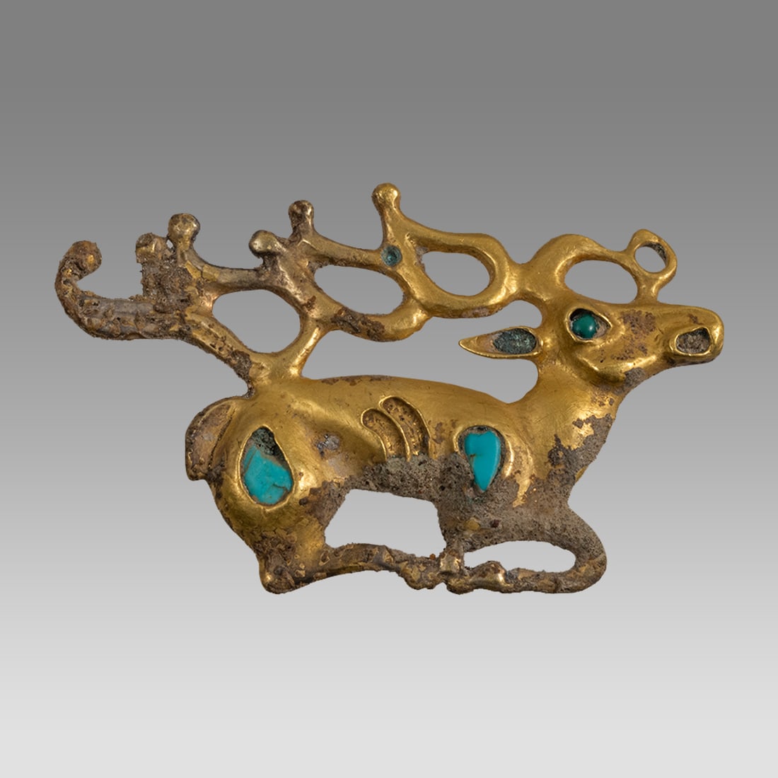 A SCYTHIAN GOLD & GEM INLAID STAG APPLIQUÉ CIRCA LATE 5TH CENTURY B.C. (1 of 2)