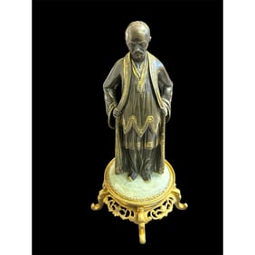 19th century French Chinoiserie Figure With gold inlay.