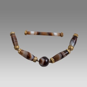 Banded Agate Beads with gilt silver mount. Possibly Ancient?