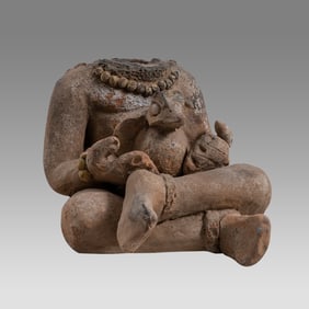 Maya Headless Body Holding Bird on Lap.