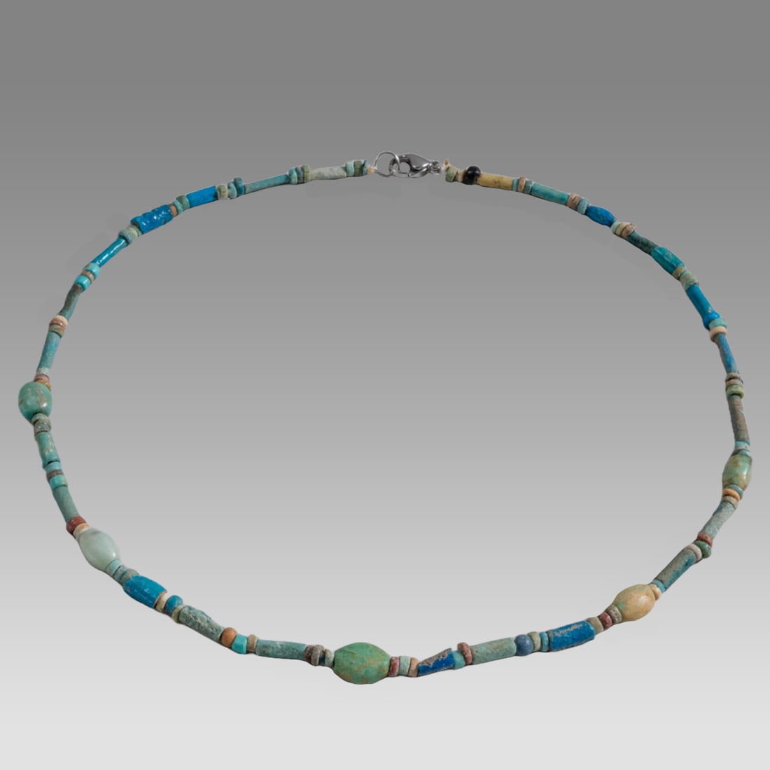 Ancient Egyptian Faience, Necklace c.300-50 BC.: Ancient Egyptian Faience, Necklace c.300-50 BC. Size 18 1/4 inches length. Great Looking single strand Faience Bead necklace. wearable. Provenance: Ex Secret Eyes Gallery New York 1970's-1980's
