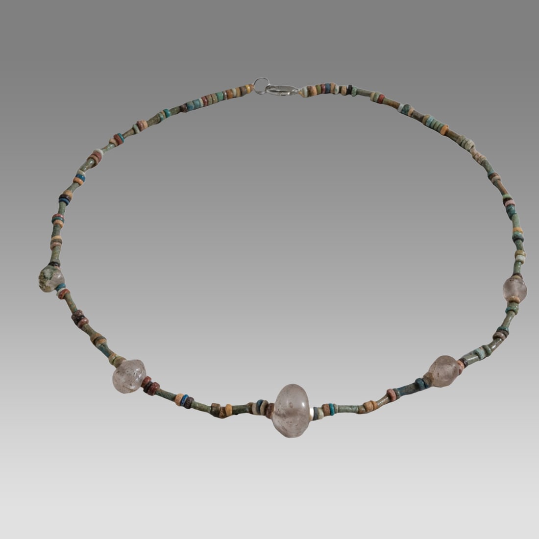 Ancient Egyptian Faience, Necklace c.300-50 BC.: Ancient Egyptian Faience, Necklace c.300-50 BC. Size 17 1/2 inches length. Great Looking single strand Faience Bead necklace with crystal beads. wearable. Provenance: Ex Secret Eyes Gallery New York 1