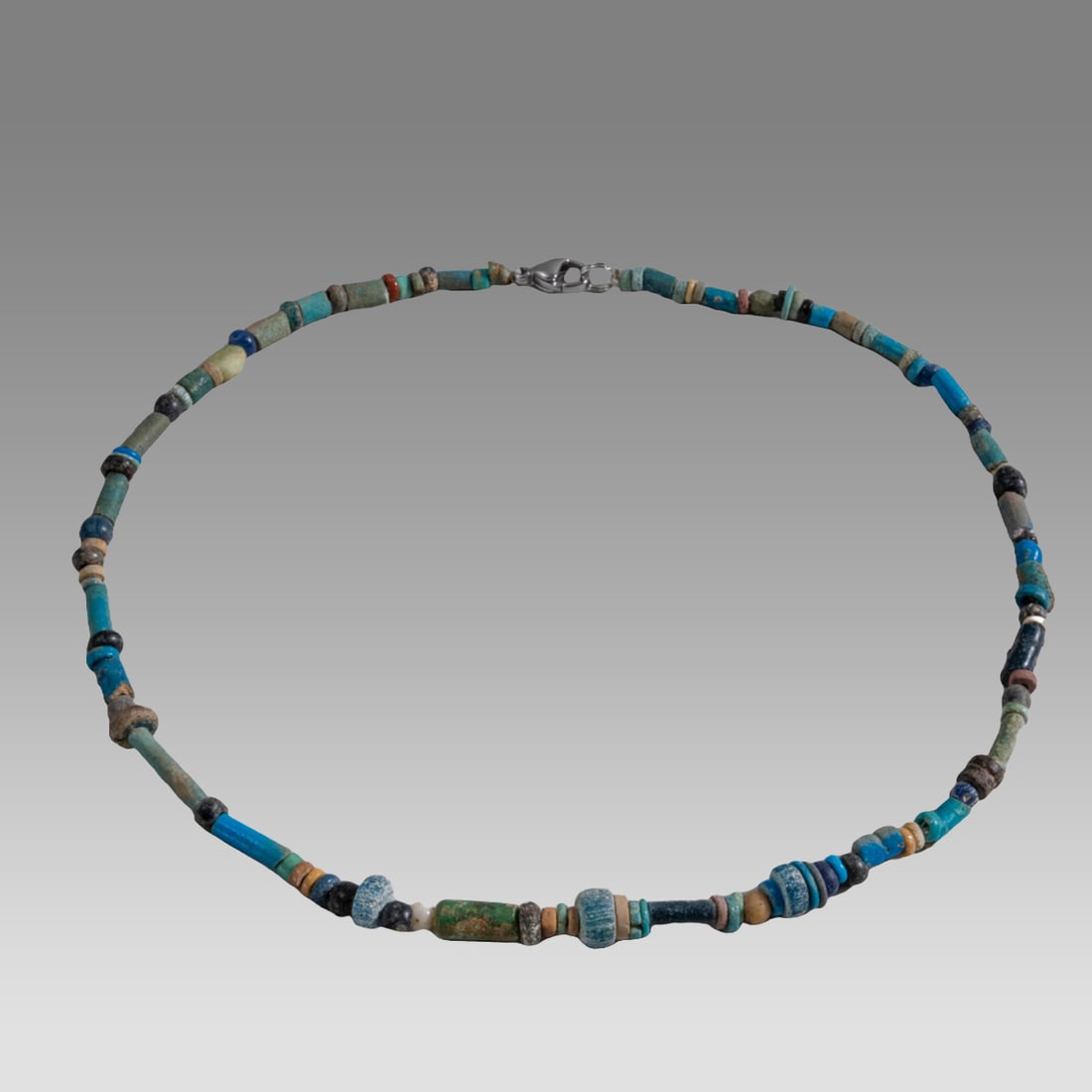 Ancient Egyptian Faience, Necklace c.300-50 BC.: Ancient Egyptian Faience, Necklace c.300-50 BC. Size 16 1/2 inches length. Great Looking single strand Faience Bead necklace. wearable. Provenance: Ex Secret Eyes Gallery New York 1970's-1980's