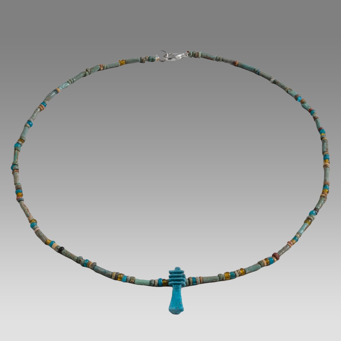 Ancient Egyptian Faience, Necklace c.300-50 BC.: Ancient Egyptian Faience, Necklace c.300-50 BC. Size 18 inches length. Great Looking single strand Faience Bead necklace with amulet. wearable. Provenance: Ex Secret Eyes Gallery New York 1970's-1980'