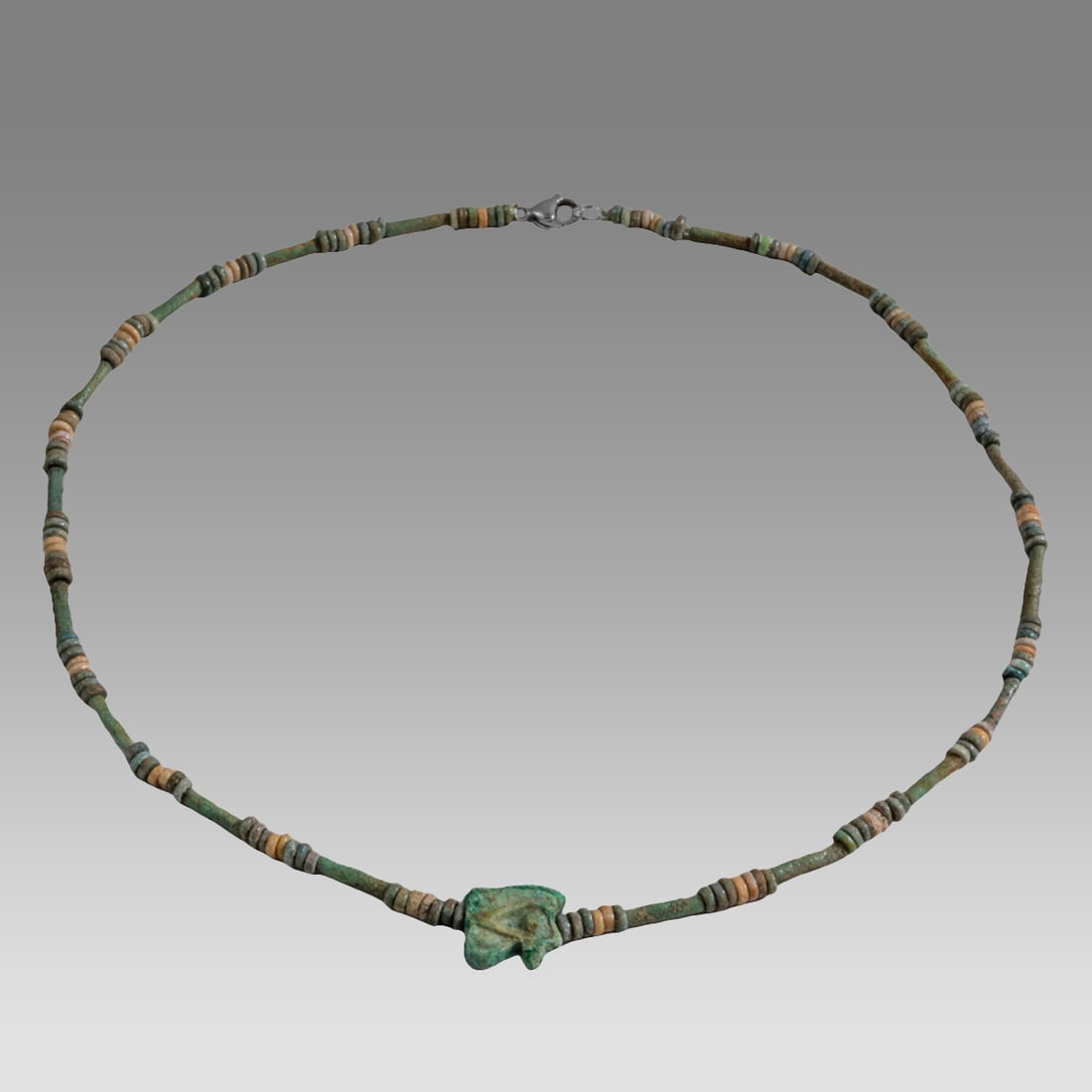 Ancient Egyptian Faience, Necklace c.300-50 BC.: Ancient Egyptian Faience, Necklace c.300-50 BC. Size 19 inches length. Great Looking single strand Faience Bead necklace with amulet. wearable. Provenance: Ex Secret Eyes Gallery New York 1970's-1980'