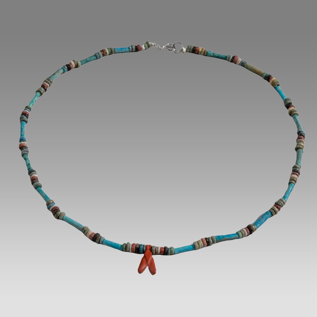 Ancient Egyptian Faience, Necklace c.300-50 BC.: Ancient Egyptian Faience, Necklace c.300-50 BC. Size 16 1/2 inches length. Great Looking single strand Faience Bead necklace with amulet. wearable. Provenance: Ex Secret Eyes Gallery New York 1970's-1