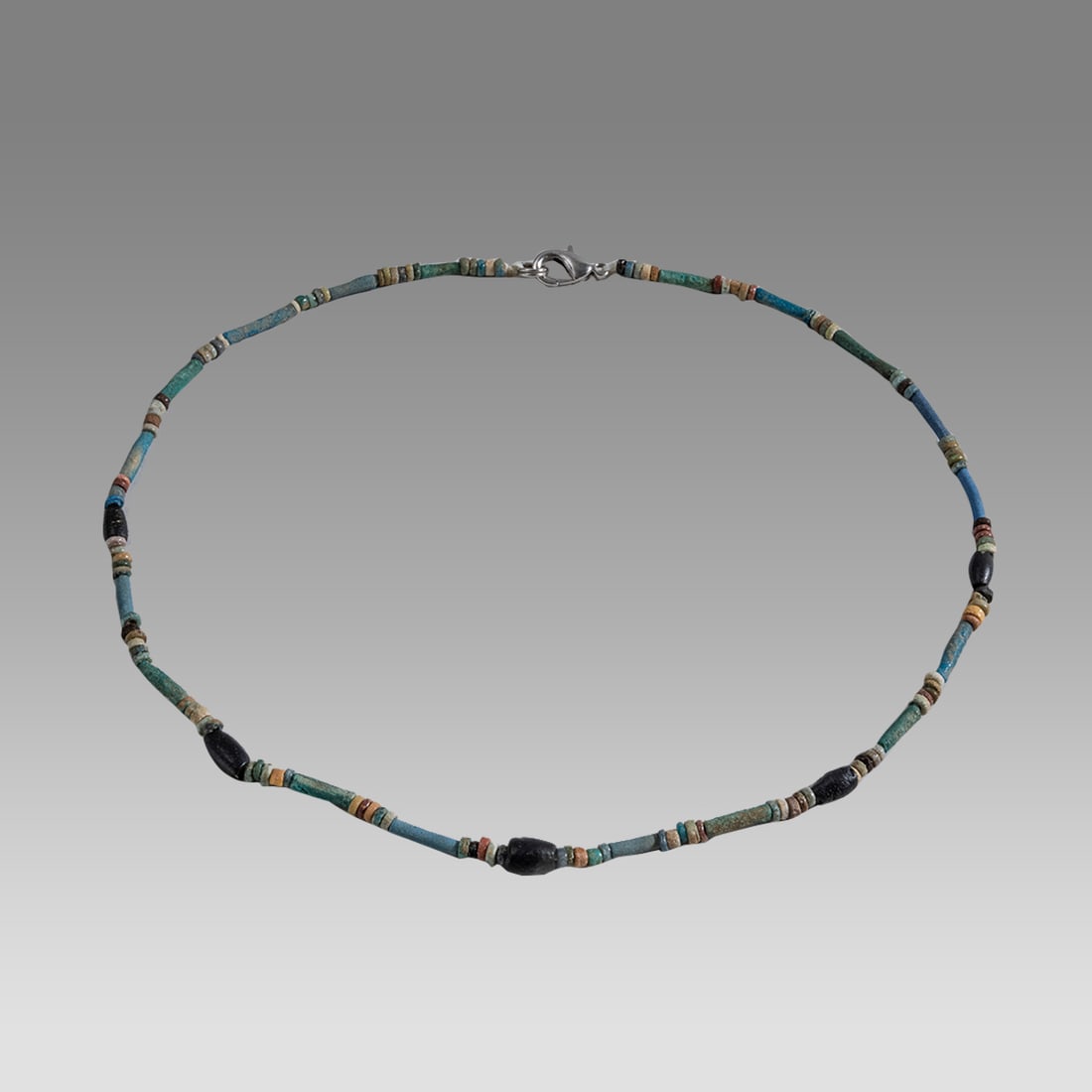 Ancient Egyptian Faience, Necklace c.300-50 BC.: Ancient Egyptian Faience, Necklace c.300-50 BC. Size 17 5/8 inches length. Great Looking single strand Faience Bead necklace. wearable. Provenance: Ex Secret Eyes Gallery New York 1970's-1980's