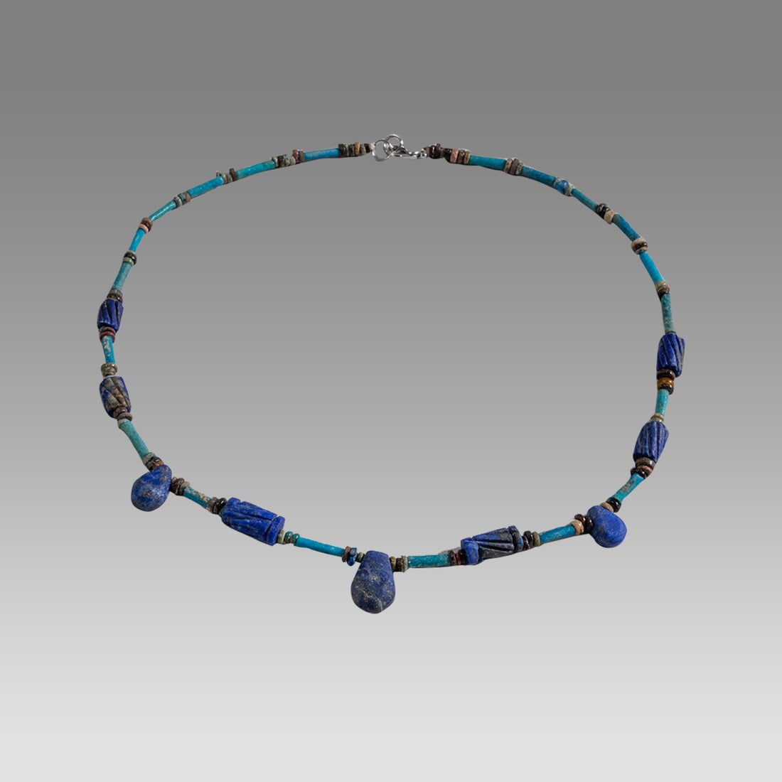 Ancient Egyptian Faience, Necklace c.300-50 BC.: Ancient Egyptian Faience, Necklace c.300-50 BC. Size 17 3/4 inches length. Great Looking single strand Faience Bead necklace with modern lapis lazuli beads. wearable. Provenance: Ex Secret Eyes Galler