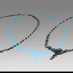 Ancient Roman Glass Bead Necklace c.200 AD.: Ancient Roman Glass Bead Necklace c.200 AD. Size 17 1/4 inches length. Great Looking single strand blue glass bead necklace. wearable. Provenance: Ex Secret Eyes Gallery New York 1970's-1980's