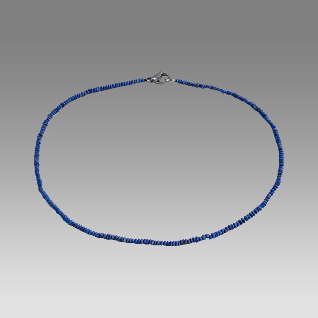 Ancient Roman Lapis Lazuli Bead Necklace c.2nd-3rd cent AD.: Ancient Roman Lapis Lazuli Bead Necklace c.2nd-3rd cent AD. Size 14 1/2 inches length. Great Looking single strand lapis lazuli Bead necklace. wearable. Provenance: Ex Secret Eyes Gallery New York 197