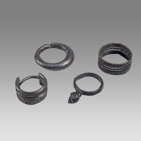 lot of 2 Ancient Roman silver earrings, 2 Bronze Rings c.2nd-4th century AD.