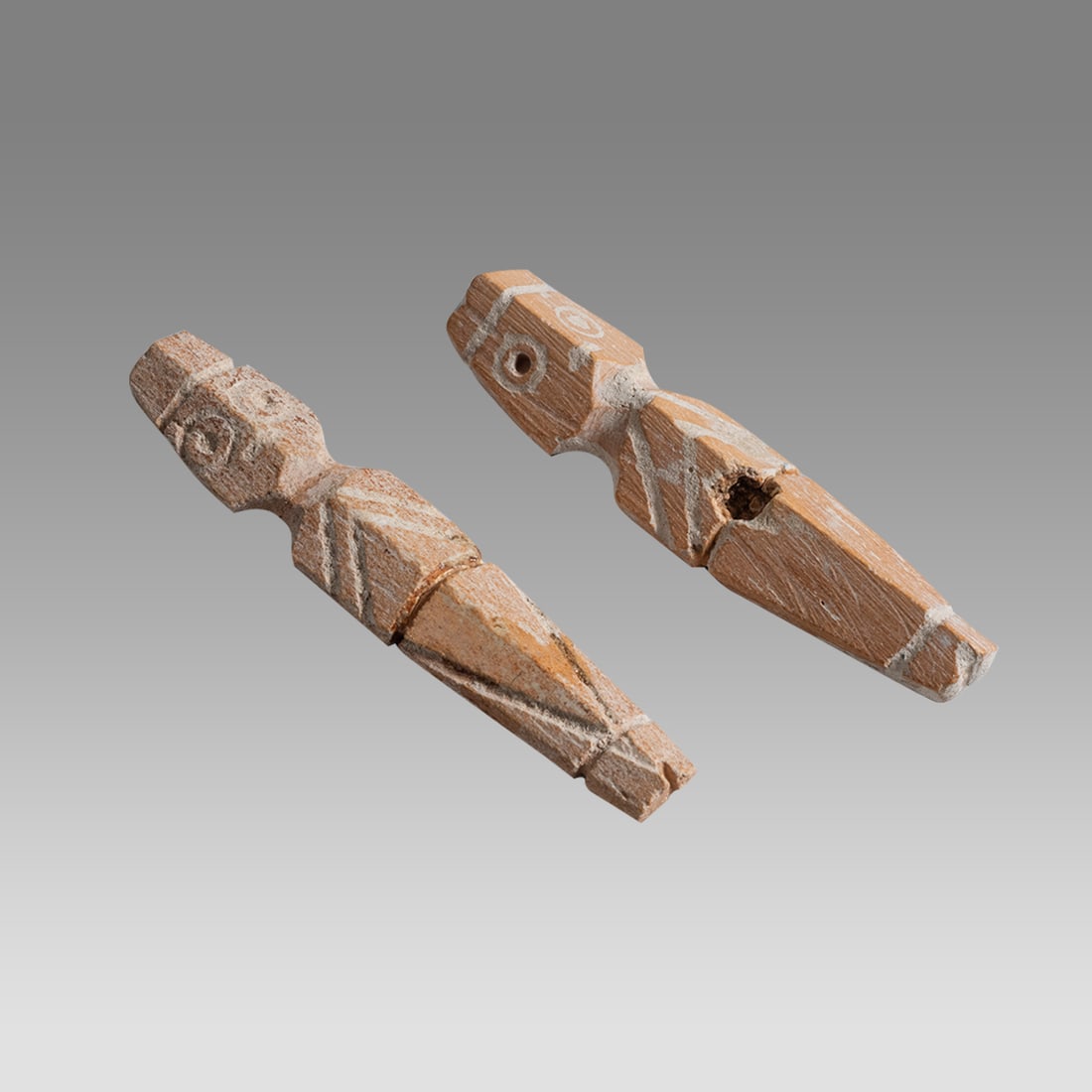 Lot of 2 Ancient Coptic Bone Idols c.5th century AD.: Lot of 2 Ancient Coptic Bone Idols c.5th century AD. Size 2 1/4 - 2 3/8 inches high. A matching pair of carved bone Idols with etched details. Provenance: Ex NYC Collection acquired in the USA Market