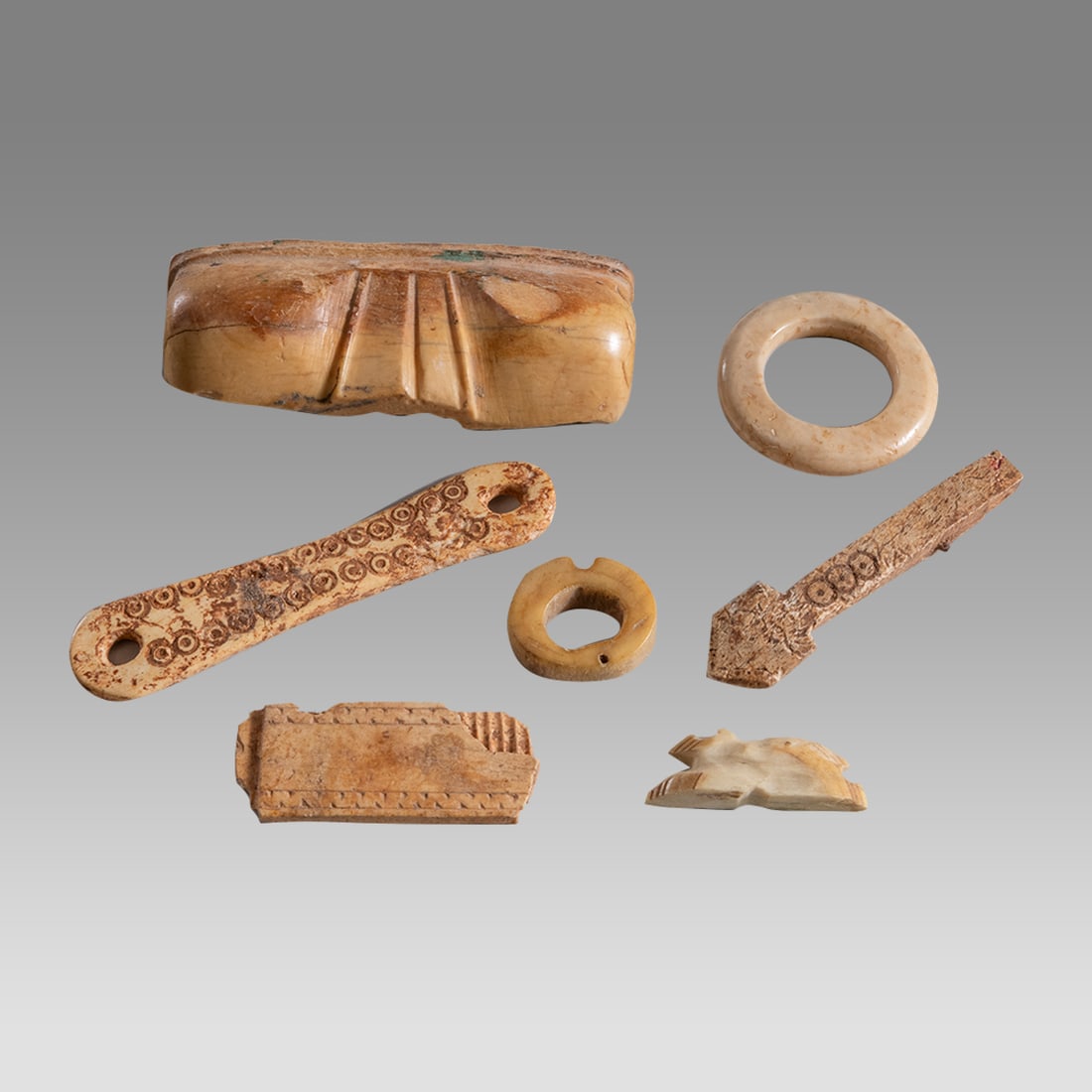 Lot of 6 Ancient Coptic Bone fragments c.2nd-5th century AD.: Lot of 6 Ancient Coptic Bone fragments c.2nd-5th century AD. Size 0 7/8 - 3 inches length. A collection of mixed ornaments carved out of bone with circle decoration. Provenance: Ex NYC Collection acqu