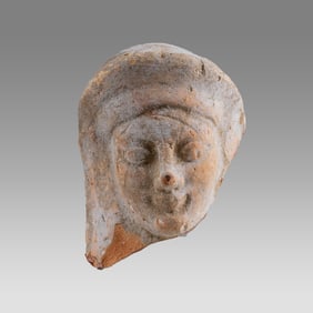 Protome of a Woman. Greek. 500-300 BC. 3 inches.