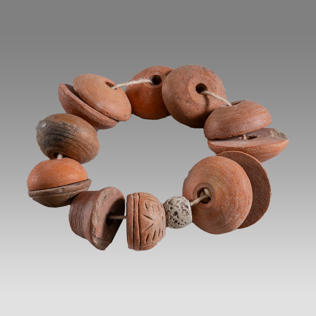 Lot of 14 Ancient Roman Pottery Soindle Whorls c.2nd century AD. (1 of 1)