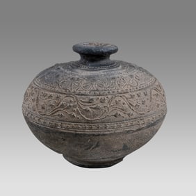 Islamic Persian stoneware Mashhad Vessel with floral decoration c.12th century AD.