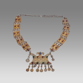 Antique Tekke pectoral necklace. High grade silver with gold fire gilding and glass stone insets.
