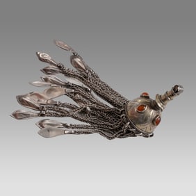 Antique Tekke Turkoman hat topper. High grade silver with gold fire gilding and carnelian stone