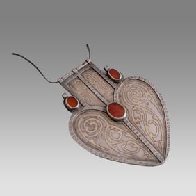 Antique Turkoman Silver pendant. High grade silver with fire gilding, carnelian stone inset.