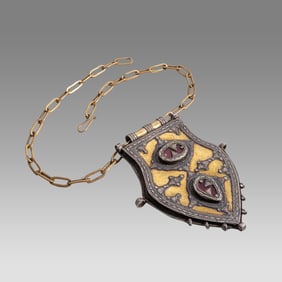 Antique Turkoman Silver pendant. High grade silver with fire gilding, carnelian stone inset.
