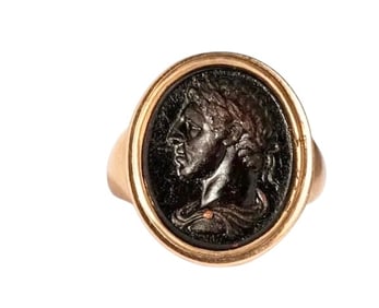 A Neoclassical Gold and Glass Finger Ring with a Portrait Head of a Roman Emperor