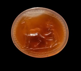 A Roman Carnelian Ring Stone with a Goatherder Milking a Goat Circa 3rd Century A.D.
