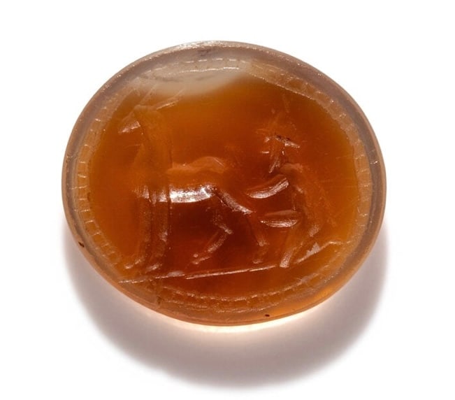 A Roman Carnelian Ring Stone with a Goatherder Milking a Goat Circa 3rd Century A.D. (1 of 3)