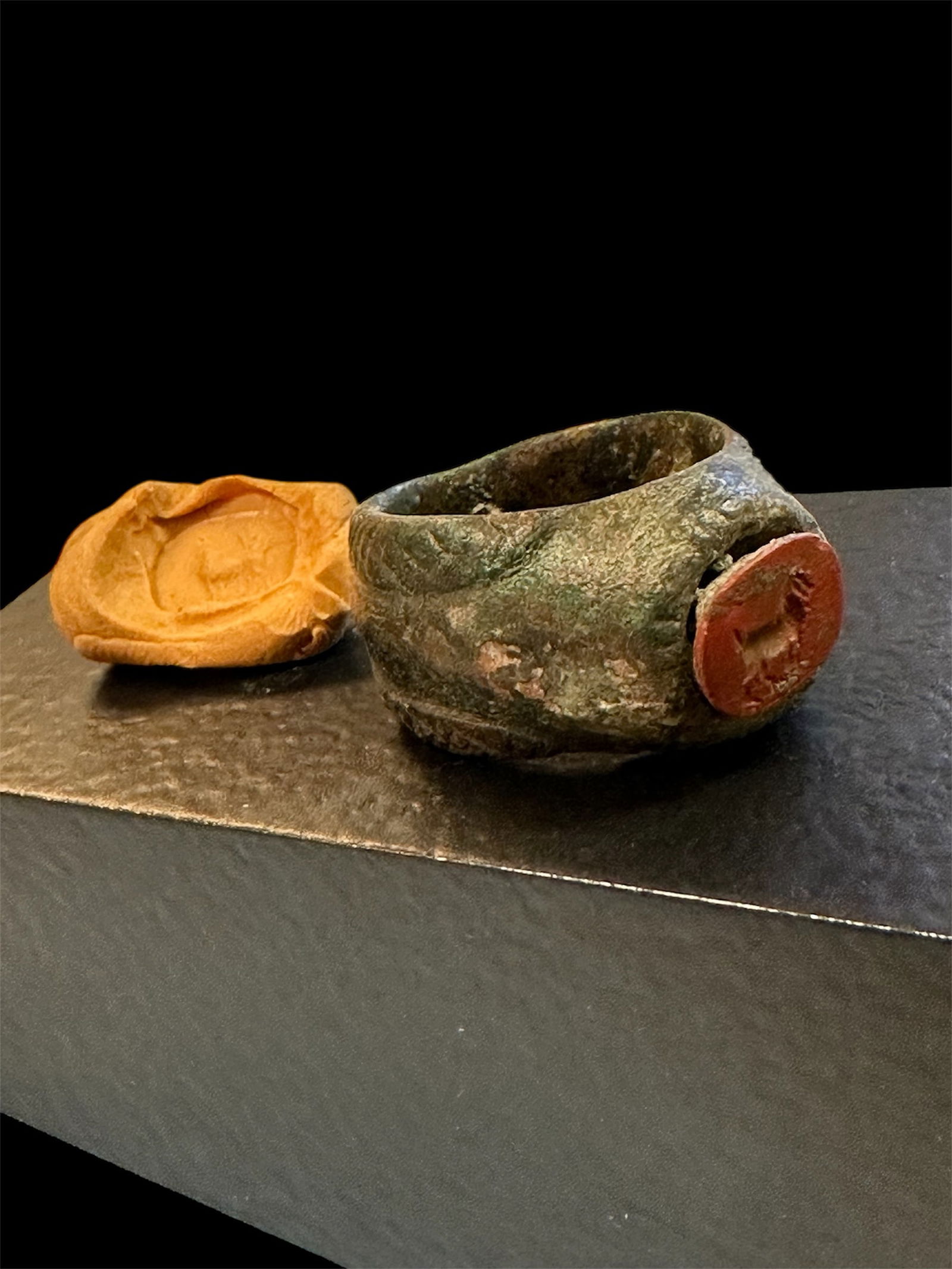 Ancient Roman Bronze With Jasper Intaglio c.2nd century AD.: Ancient Roman Bronze Ring with Red Jasper Intaglio Circa 2nd Century A.D. Diameter: 22 mm Cast bronze band with red jasper intaglio depicting a standing goatA Roman bronze ring featuring a cast bronze