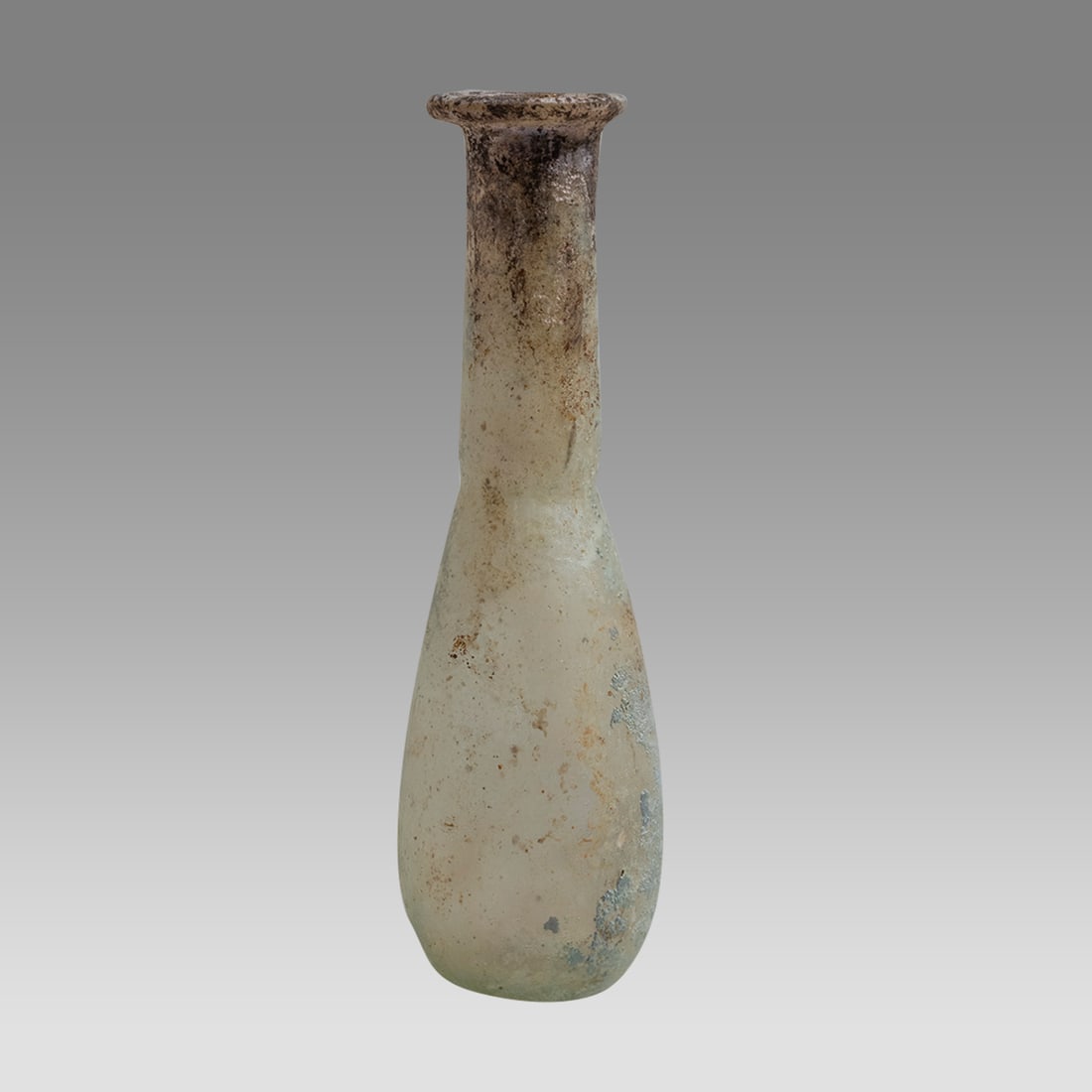 Ancient Roman Unguentarium Glass c.1st-2nd century AD.: Ancient Roman Unguentarium Glass c.1st-2nd century AD. Size 3 1/2 inches high. Ancient Roman Unguentarium glass with tall neck and slightly flared rim. Lovely form and fine blue patina. Provenance: Ex