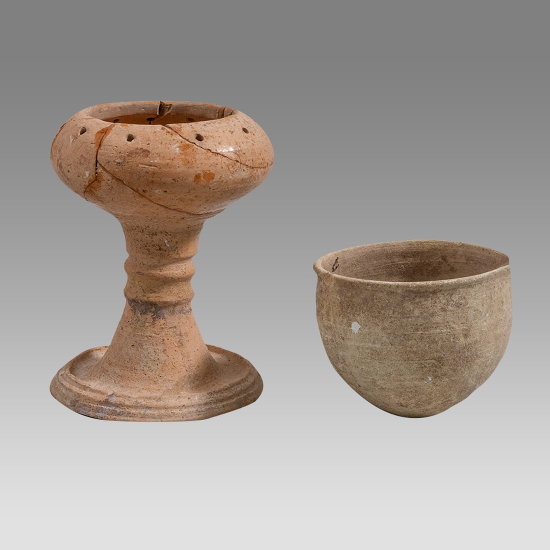 Ancient Holy Land Iron Age II Fenestrated Pottery Chalice, Bowl ca. 8th Century BCE. (2): Ancient Holy Land Iron Age II Fenestrated Pottery Chalice, Bowl ca. 8th Century BCE. (2) Size 5 1/2 - 3 inches high. Time of Omri, father of King Ahab who was husband to Jezebel. Found in the Holy Lan