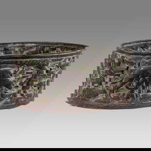 Ancient Seljuk Bronze Bowl With Battle Scene c.10th century AD.: Ancient Seljuk Bronze Bowl With Battle Scene c.10th century AD. Size 3 1/2 inches diameter. Fine quality cast bronze round bowl with a relief battle scene. Choice patina. Provenance: From a Private NY