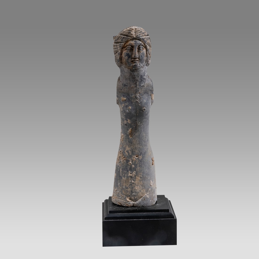 Ancient Holyland Byzantine Bone Idol c.5th century AD.: Ancient Holyland Byzantine Bone Idol c.5th century AD. Size 4 3/4 inches high. + stand. Fine carved bone female Idol. Originally had seperate hands now missing. Custom mounted. Provenance: From a Priv