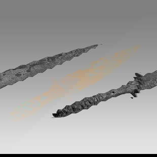 Ancient Near Eastern, Luristan Bronze Dagger with Lotus Handle c.800 BC.: Ancient Near Eastern, Luristan Bronze Dagger with Lotus Handle c.800 BC. Size 9 7/8 inches length. Rare type small bronze dagger with lotus handle. Near Eastern. Fine patina. Provenance: Ex NYC Collec
