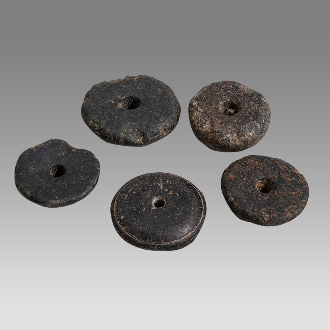 Lot of 5 Ancient Roman Stone Spindle Whorls c.2nd century AD. (1 of 2)