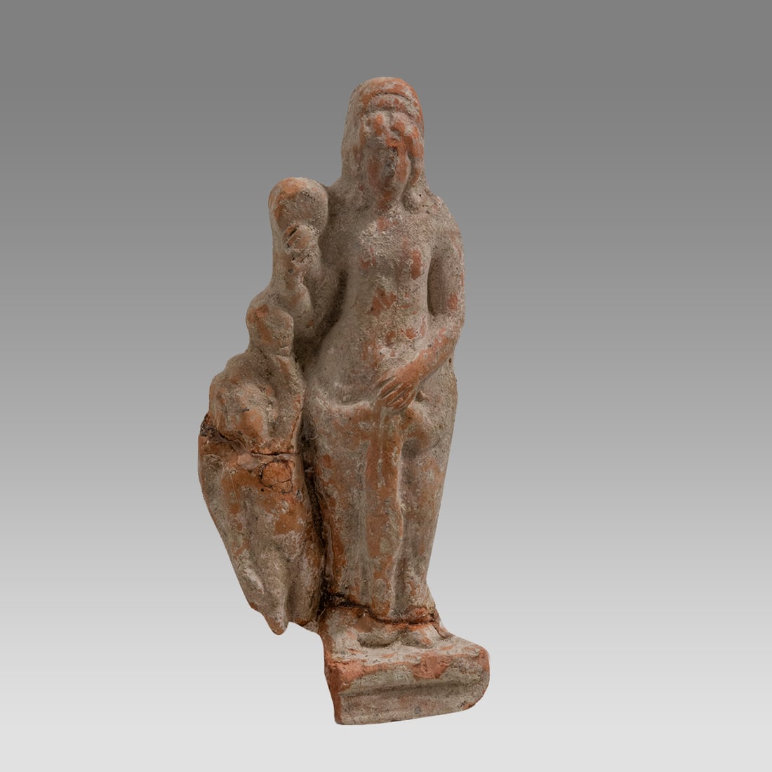 Roman Terracotta Venus with Eros standing on right c.1st to 3rd AD.: Roman Terracotta Venus with Eros standing on right c.1st to 3rd AD. Size 6 1/4 inches high. Hollow Terracotta Venus with eros hand on belly. Roman Period. Very fascinating iconography. From the collec
