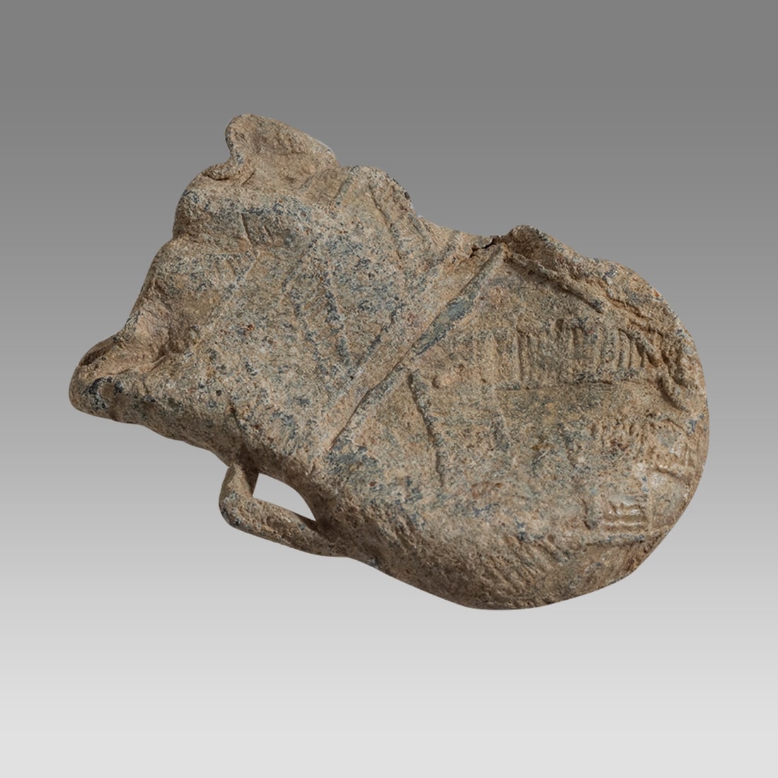 Lead Ampulla, Pilgrim’s Flask. Late Byzantine to Medieval period - 9th to 15th centuries AD.: Lead Ampulla, Pilgrim’s Flask. Late Byzantine to Medieval period - 9th to 15th centuries AD. Pilgrims would buy “Holy Water” at a shrine for the saints and take it home from their pilgrimage