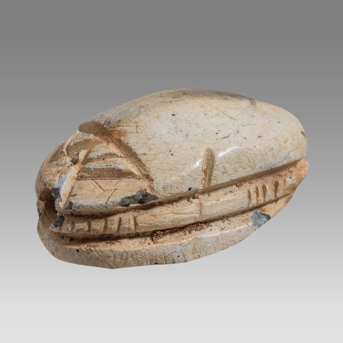 Ancient Egyptian Steatite stone Scarab c.1500-1100 BCE.: Ancient Egyptian Steatite stone Scarab c.1500-1100 BCE. Size 19 x 13 mm. Glazed steatite scarab New Kingdom with stealized beatle back. Provenance: Private collection, bought in Grays Market, previous