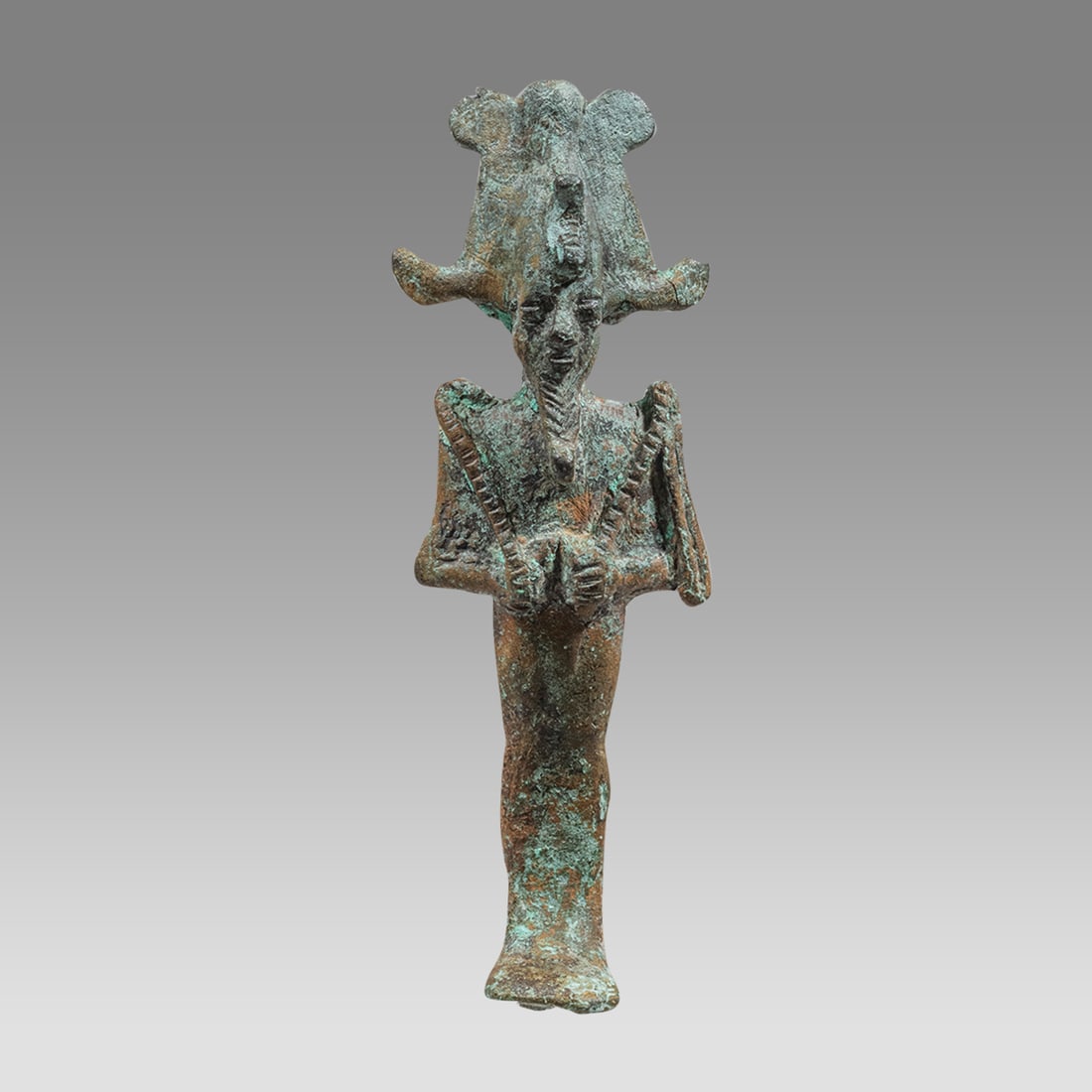 Ancient Egyptian Bronze Figure Of Osiris Late Period c.634-330 BC.: Ancient Egyptian Bronze Figure Of Osiris Late Period c.634-330 BC. Size 3 1/2 inches high. Cast bronze figure of god Osiris in mummiform with a braided divine beard, wearing atef-crown, arms folded ac