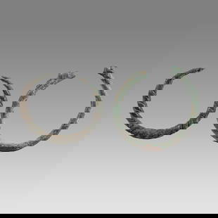 Ancient Roman Bronze Bracelets c.2nd century AD.(2): Ancient Roman Bronze Bracelets c.2nd century AD.(2) Size 2 1/4 inches diameter. Lot of 2 Ancient Bronze Bracelets snake form with choice patina. Provenance: Private collection, bought via London Art M