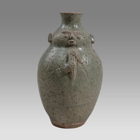 Southeast Asian Stoneware Figural Vessel.