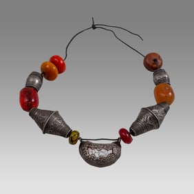 Mauritania, Natural and Phenolic Amber Trade Beads With Large Silver Beads.
