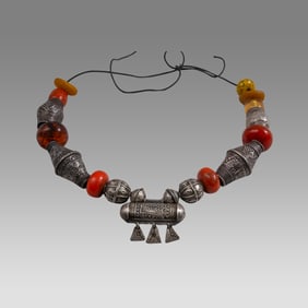 Mauritania, Natural and Phenolic Amber Trade Beads With Large Silver Beads.