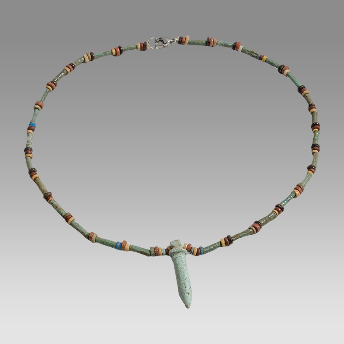 Ancient Egyptian Faience, Necklace c.300-50 BC.: Ancient Egyptian Faience, Necklace c.300-50 BC. Size 17 3/4 inches length. Great Looking single strand Faience Bead necklace with papyrus amulet. wearable. Provenance: Ex Secret Eyes Gallery New York